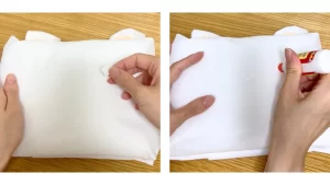 マスキングテープにボンドを付けてパーツを接着する工程